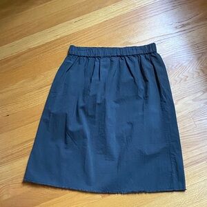 Go Gently Nation 100% organic cotton skirt. Women’s. Soft fringe hem.